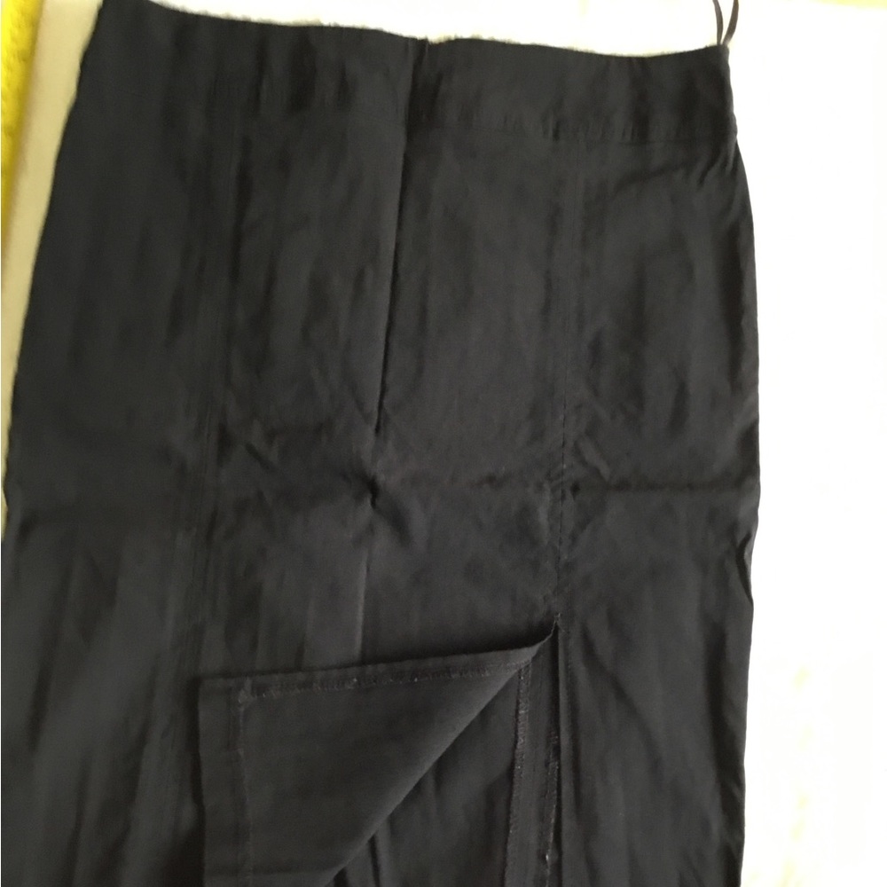 Stretch black knee length skirt.